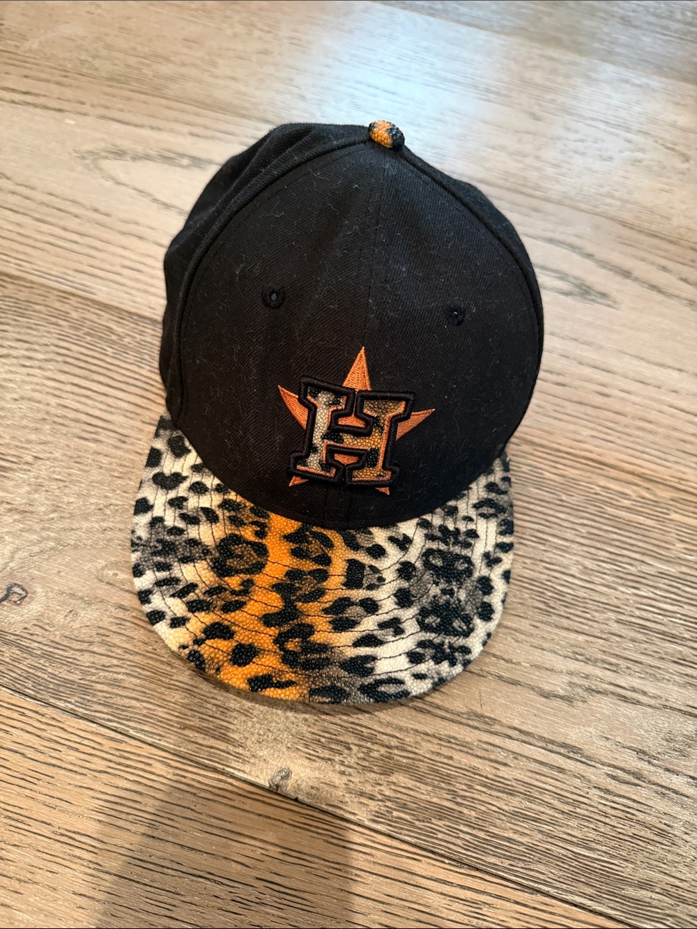 New Era Black Cap with Orange H Logo and Leopard Brim